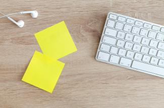 Sticky notes beside keyboard