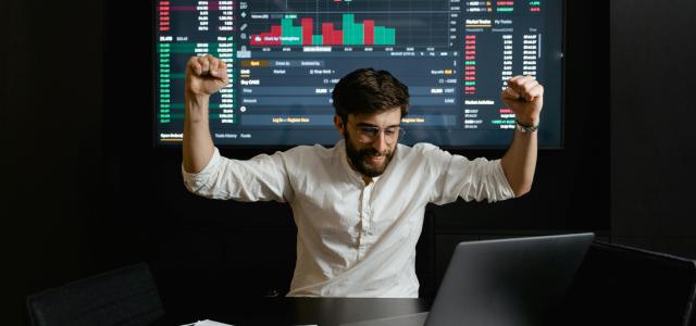 Man infront of stocks